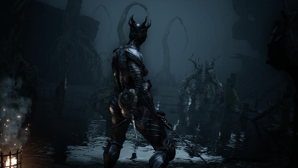 Horned warrior wades through misty swamp water, sword in hand, facing a twisted antlered creature. — Mortal Shell II screenshot