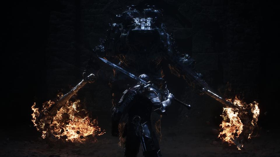 A lone warrior raises a sword against a towering giant brandishing two blazing weapons in a dark hall. — Mortal Shell II screenshot